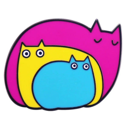 A colorful illustration of three cats—pink, yellow, and blue—echoes the Pansexual Pride Enamel Badges hues. With simple, rounded shapes and wide eyes