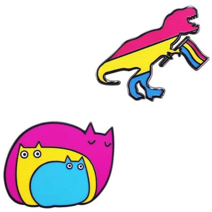 Show your pride with Pansexual Pride Enamel Badges—featuring a cute dinosaur waving the flag and three cozy cats in pink, yellow, and blue.