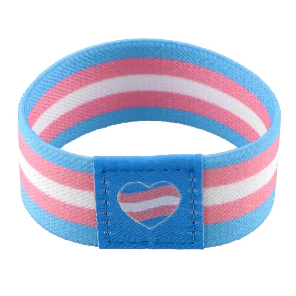 The Gay Skate fabric wristband features blue, pink, and white stripes of the transgender pride flag, plus a small matching heart on a blue patch.