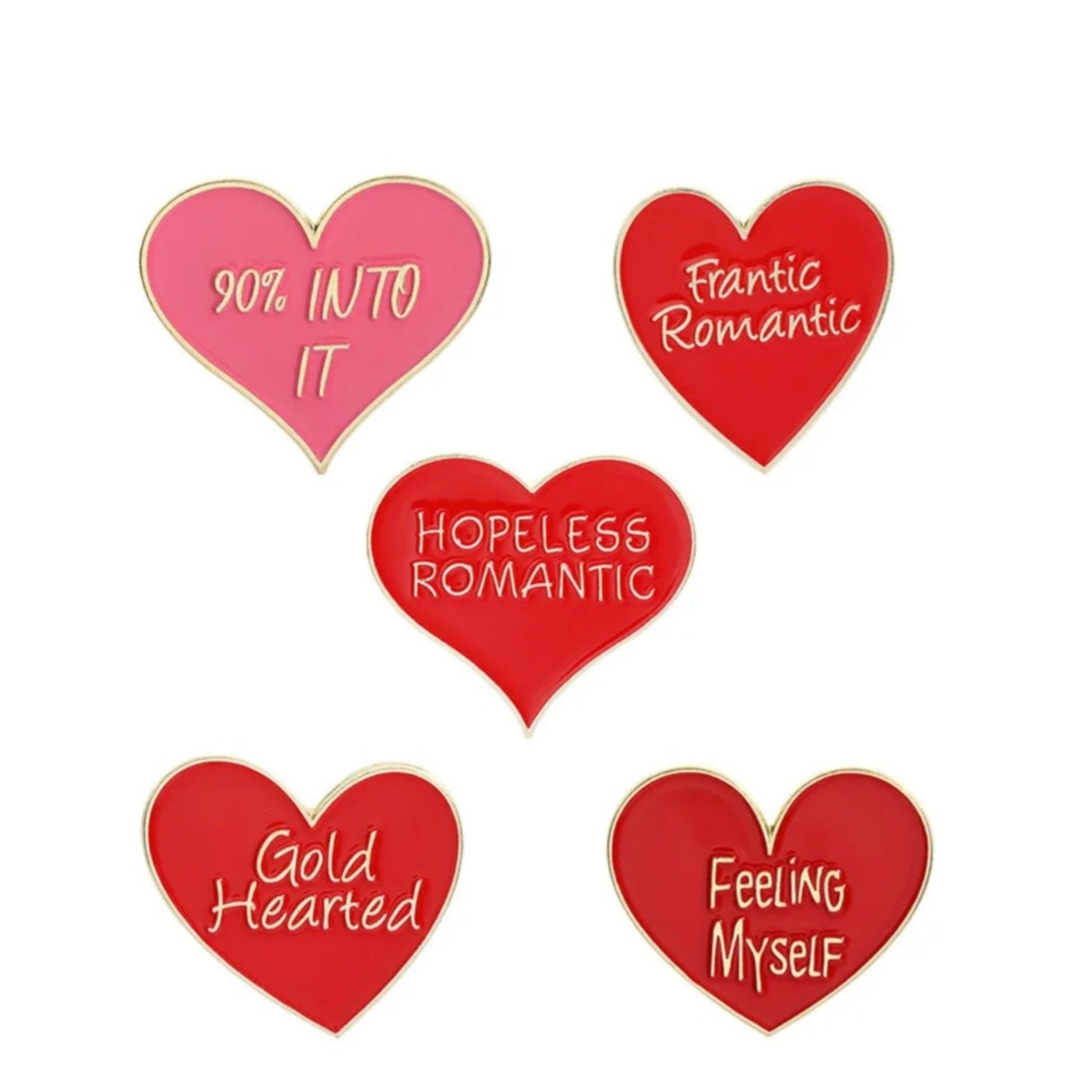 Five red heart-shaped enamel pins—90% INTO IT (pink), Frantic Romantic, Hopeless Romantic, Gold Hearted, and Feeling Myself (red)—with playful phrases in red, gold, or pink on a white background.