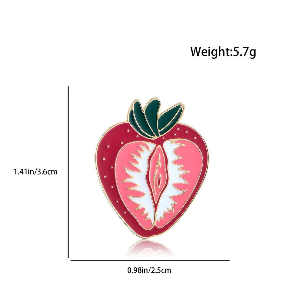 Strawberry Vulva pin is shaped like a strawberry sliced in half, featuring seeds and green leaves. Its inner pattern celebrates feminist, body-positive, sapphic WLW lesbian pride. Size: 3.6cm x 2.5cm; weight: 5.7g.