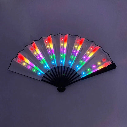The My Cutesy Era black-handled folding fan features translucent panels lit by colorful LEDs, creating vibrant rows of red, yellow, green, blue, and purple—an eye-catching LED fan perfect for displays against dark backgrounds.