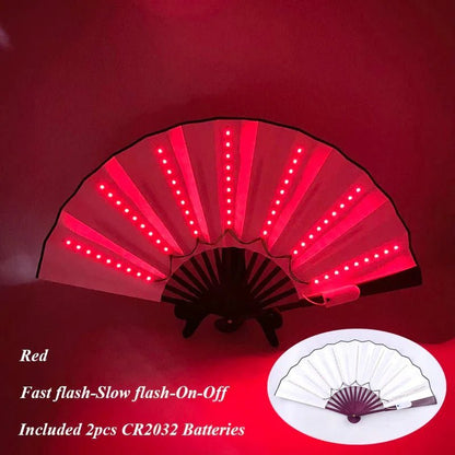 A My Cutesy Era red LED fan glows with rows of small lights against a red background. An inset shows the unlit fan, white with a black frame. Text below details flash modes and included batteries.