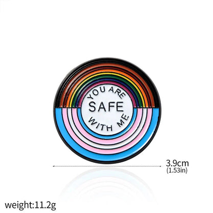 Round enamel badge features rainbow and trans flag colors with YOU ARE SAFE WITH ME in the center. Size: 3.9 cm (1.53 in), weight: 11.2g. Ships worldwide!.
