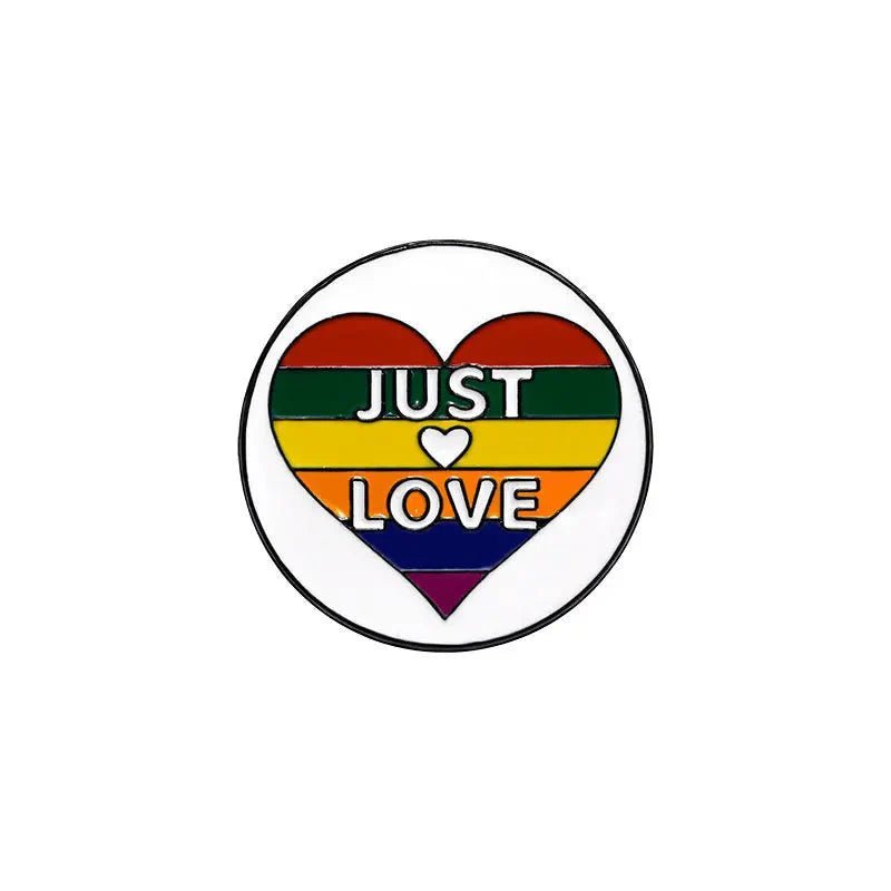 Show your pride with a heart-shaped rainbow enamel pin featuring JUST LOVE in white capitals and a heart icon. Love is love—wear it proudly! Worldwide shipping available.