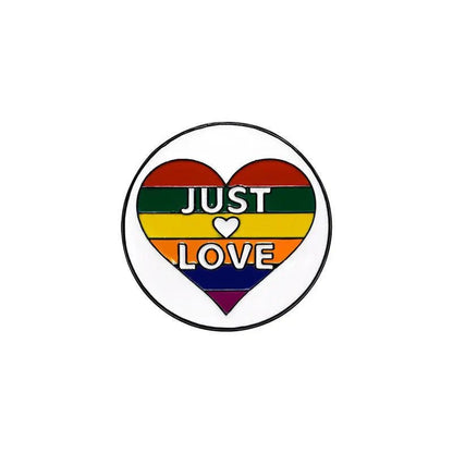 Show your pride with a heart-shaped rainbow enamel pin featuring JUST LOVE in white capitals and a heart icon. Love is love—wear it proudly! Worldwide shipping available.